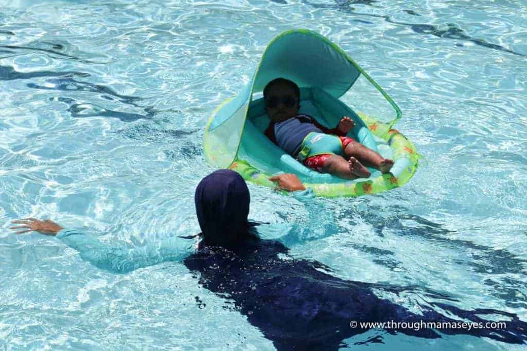 Swim Safely with Swimways Infant Baby Spring Float How to Relax at the Pool or Jacuzzi with your baby Swim Safely with 3 kids Swimming Safety Summer Floats www.throughmamaseyes.com