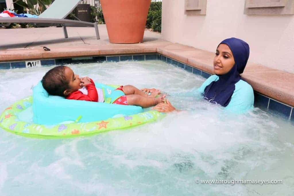 Swim Safely with Swimways Infant Baby Spring Float How to Relax at the Pool or Jacuzzi with your baby Swim Safely with 3 kids Swimming Safety Summer Floats www.throughmamaseyes.com